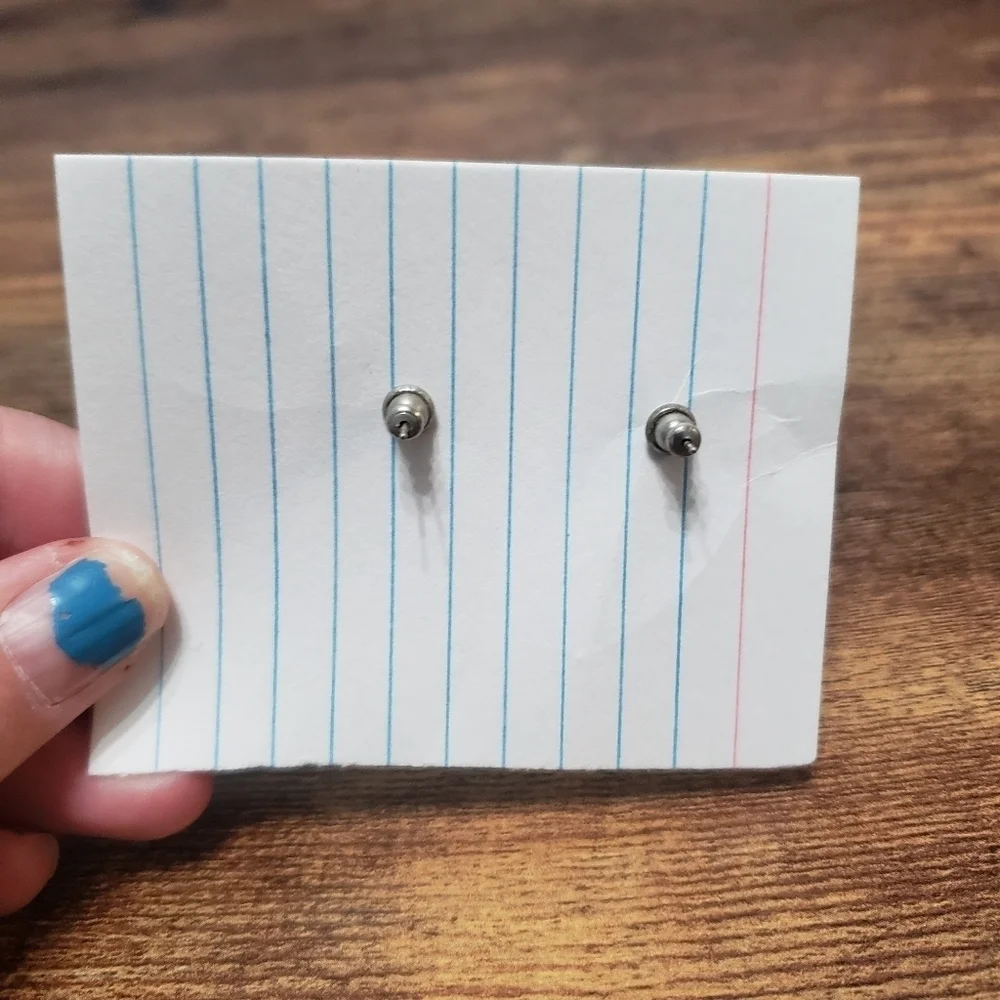 silver tone statement earrings